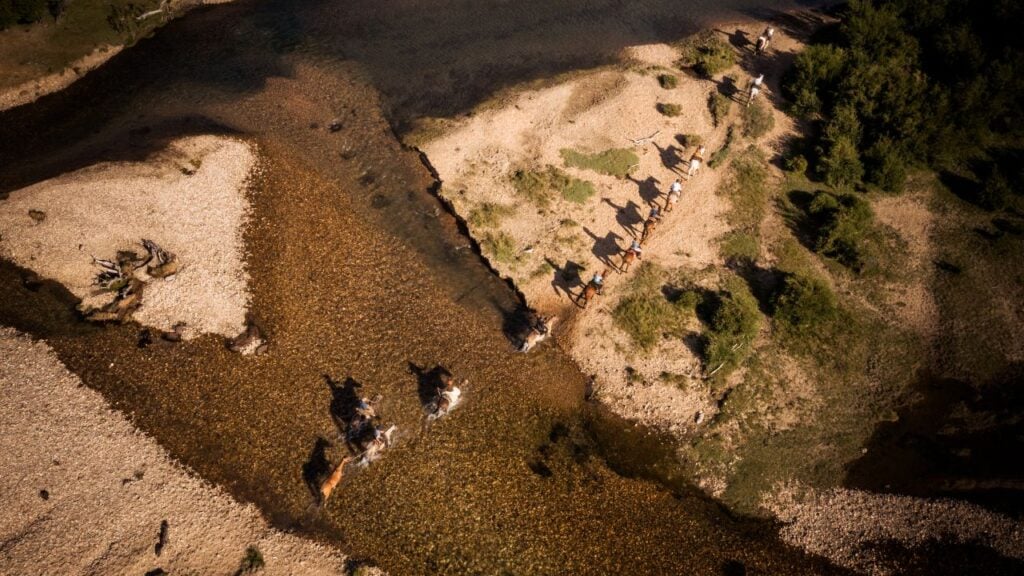 River Crossing on horseback - Patagonia Trail - Argentina