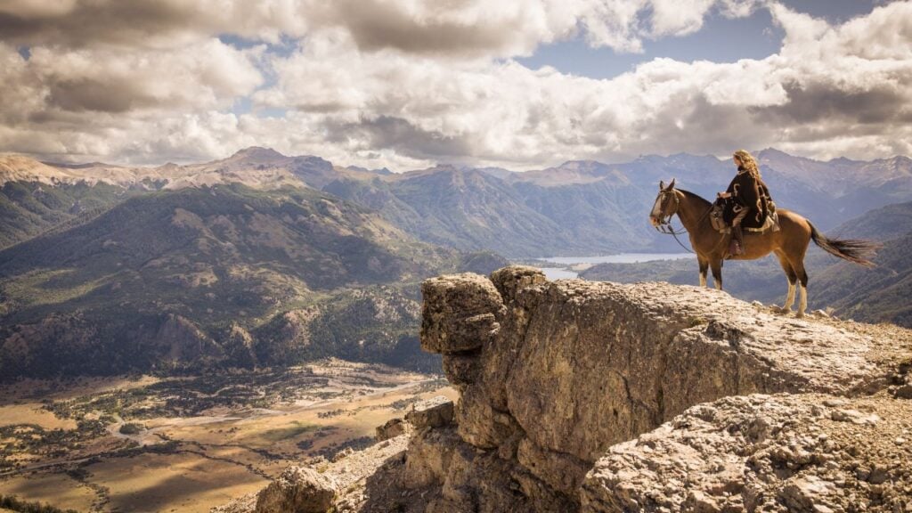 Horse Riding on the edge of cliff - Patagonia Trail - Argentina