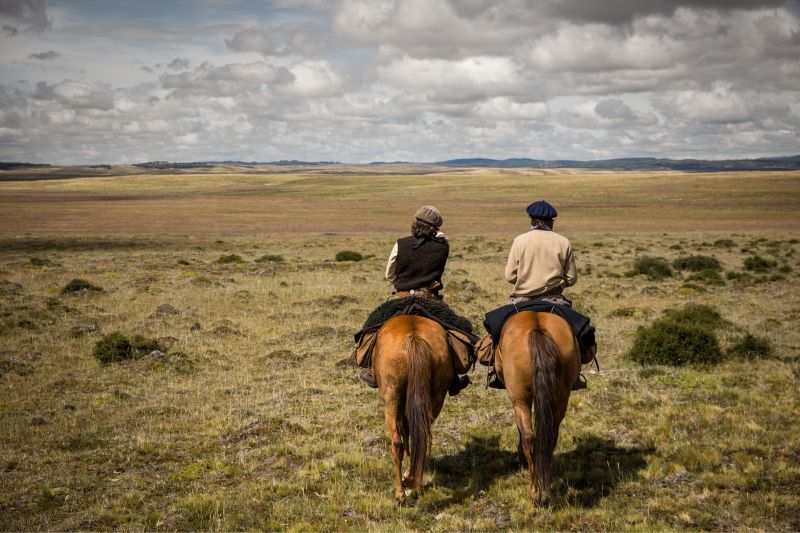 Horse riders in Tierra del Fuego, Patagonia