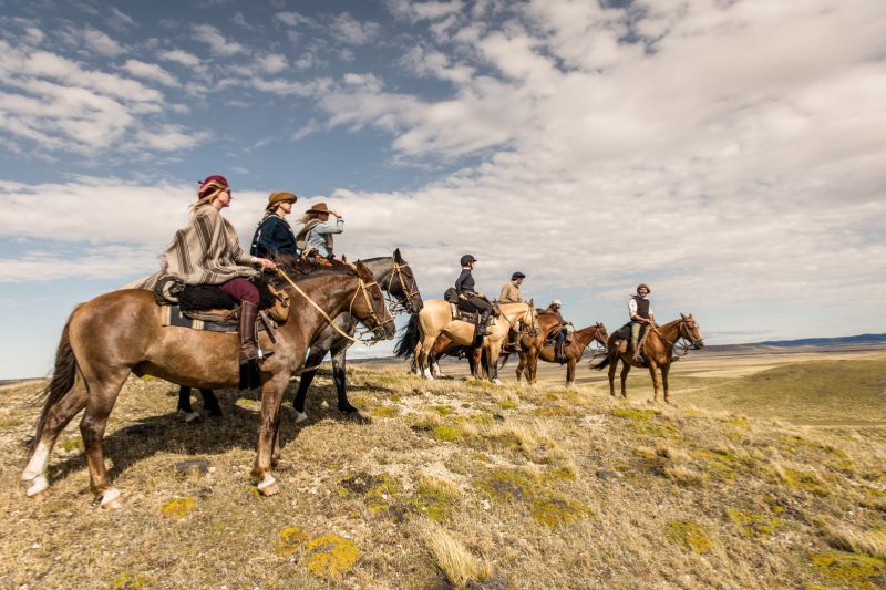 Group of horse riders in Tierra del Fuego, Patagonia
